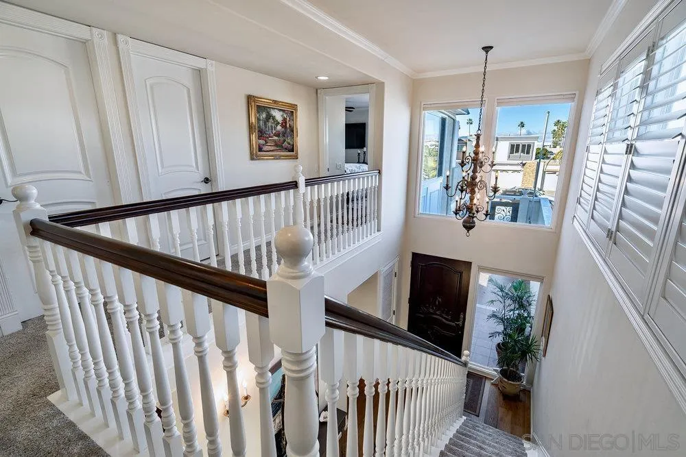 4 GingerTree Lane Coronado, CA 92118 - Photo 22 of 54 a view of entryway with wooden floor and stairs