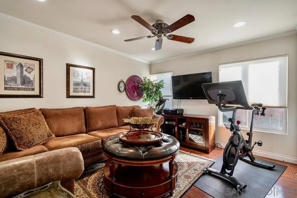 4 GingerTree Lane Coronado, CA 92118 - Photo 32 of 54 a living room with furniture a flat screen tv and a window
