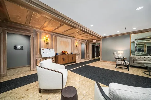 a living room with furniture and a table