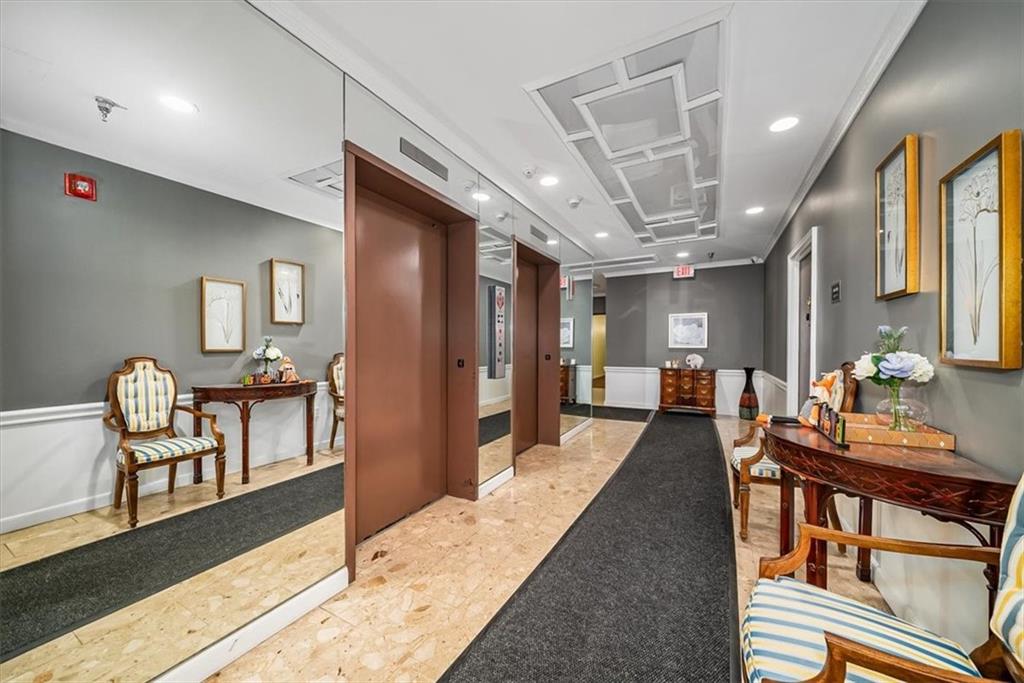 5715 Beacon Street, Unit 108 Pittsburgh, PA 15217 - Photo 4 of 27 a dining room with furniture and wooden floor