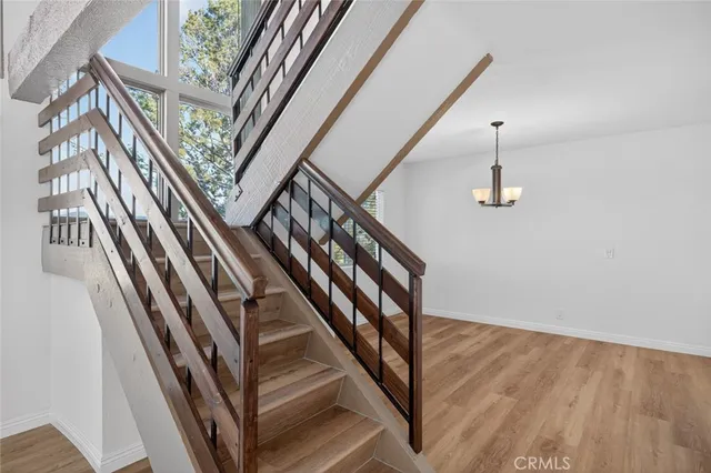 a spacious bathroom with a shower sink and mirror