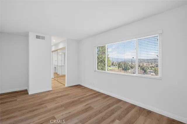 a view of staircase with white walls