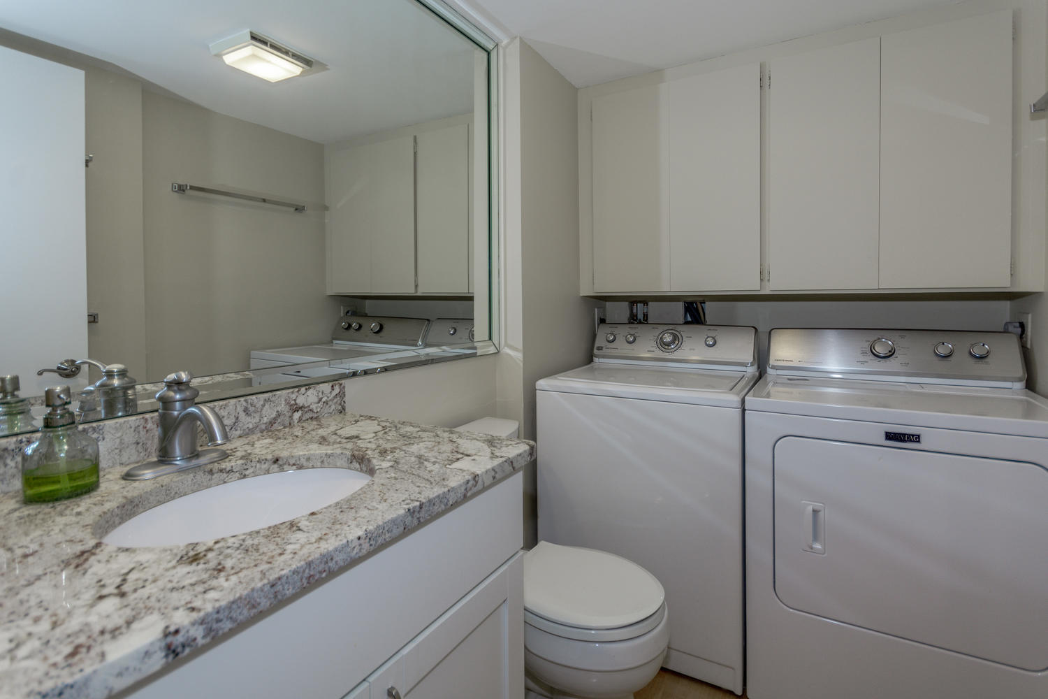 1719 17th Court Jupiter, FL 33477 - Photo 11 of 36 Powder Bathroom/Laundry