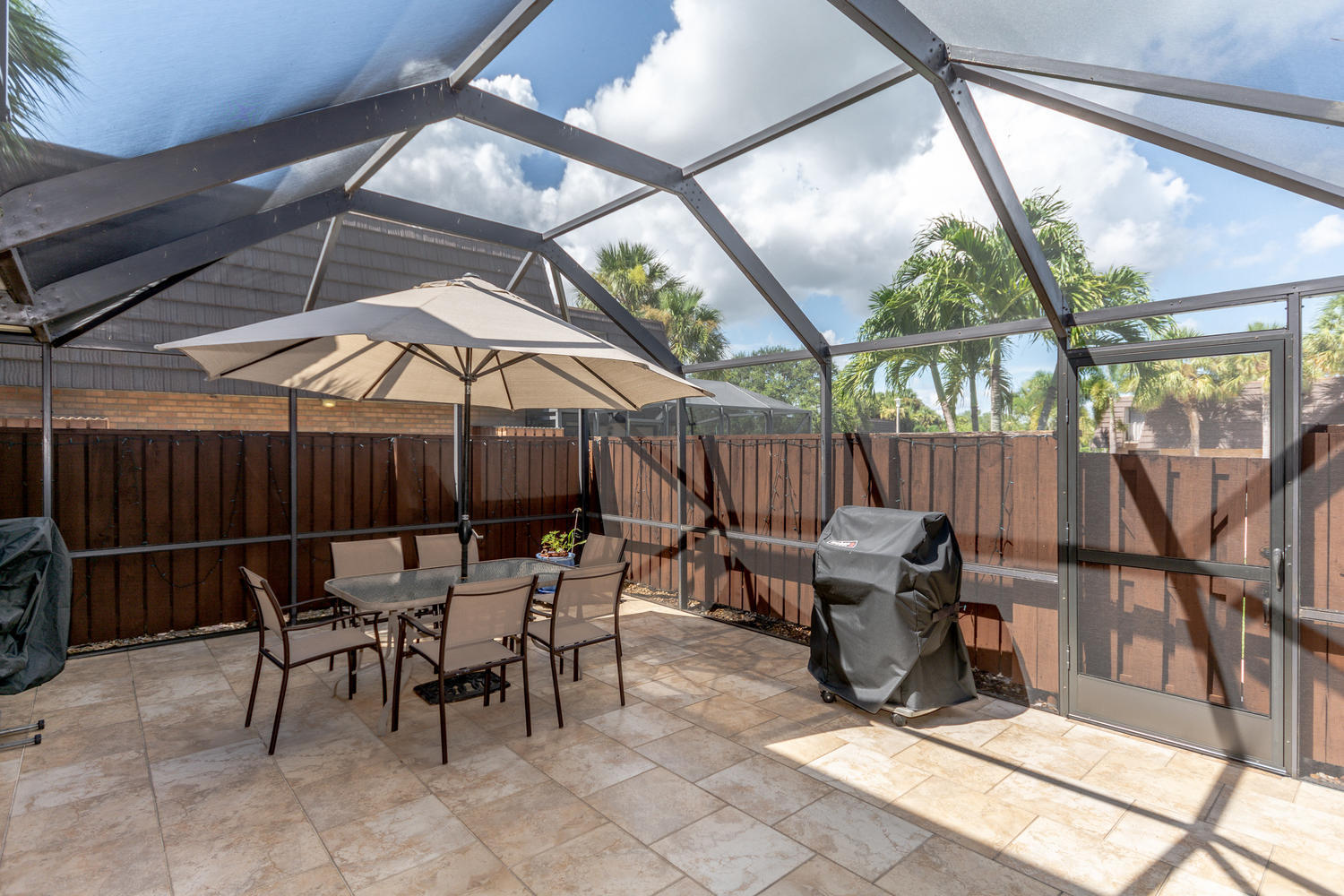 1719 17th Court Jupiter, FL 33477 - Photo 2 of 36 Screened & Tiled Patio