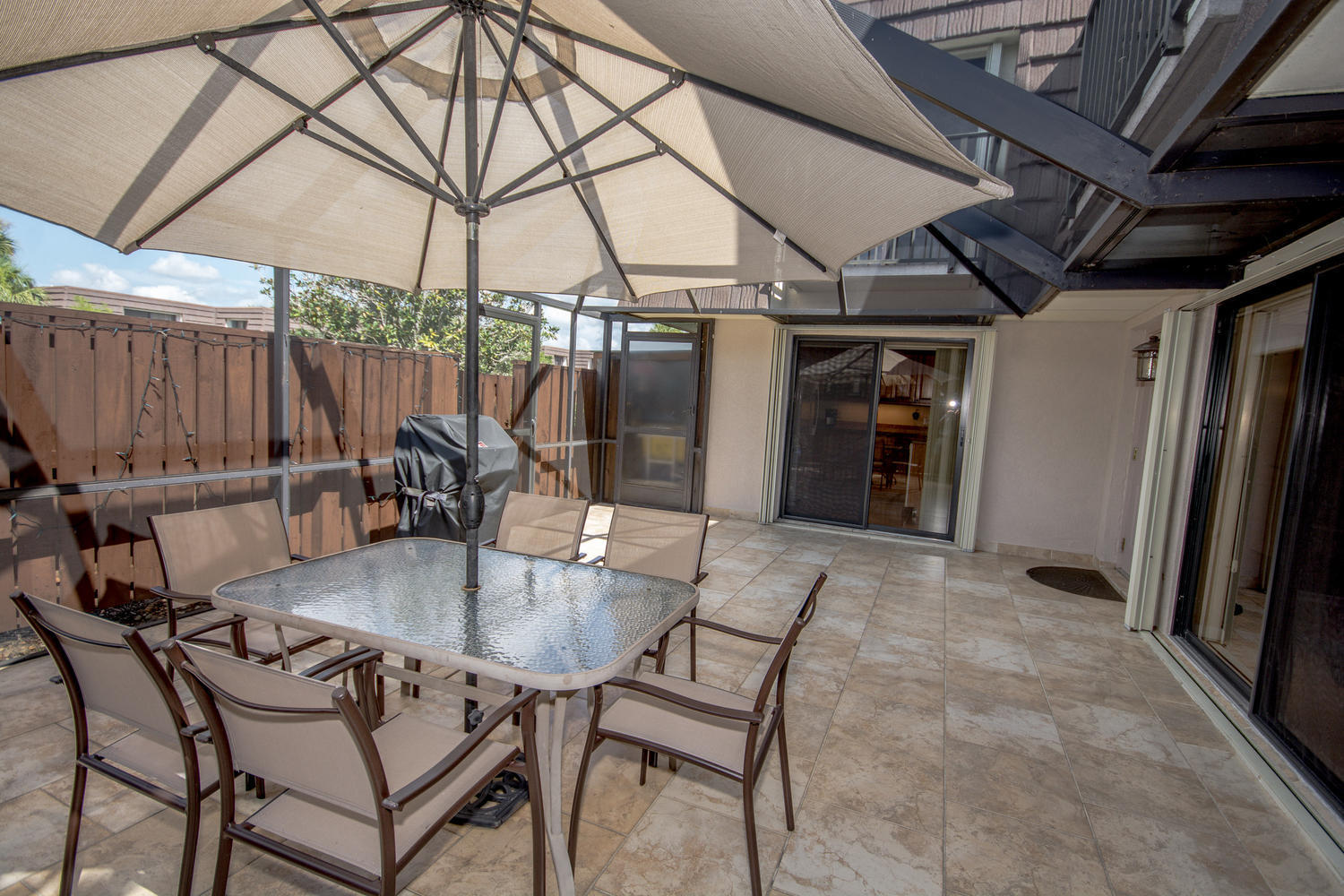 1719 17th Court Jupiter, FL 33477 - Photo 3 of 36 Screened & Tiled Patio