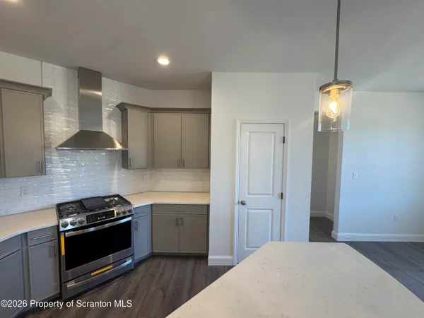 a bathroom with a sink toilet and mirror