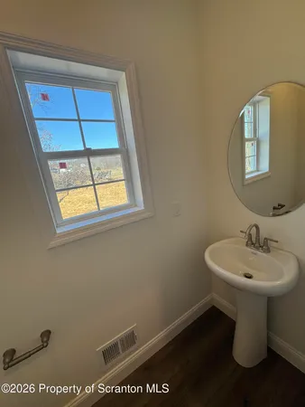 a view of a room with lots of gym equipment