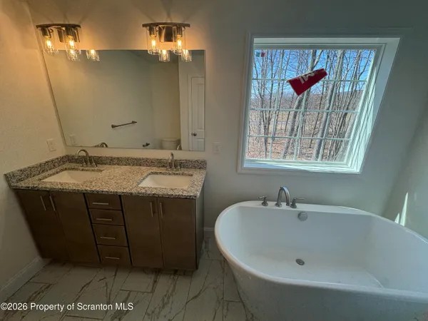 a view of a bathroom with a shower