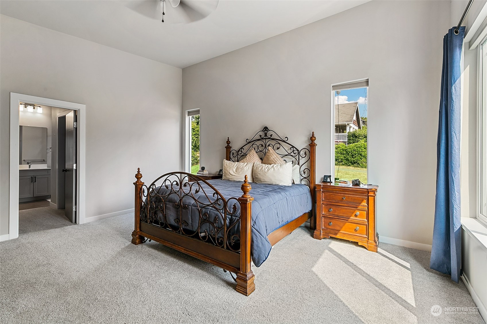 5136 South Creston Street Seattle, WA 98178 - Photo 15 of 27 a bed sitting in a bedroom next to a window