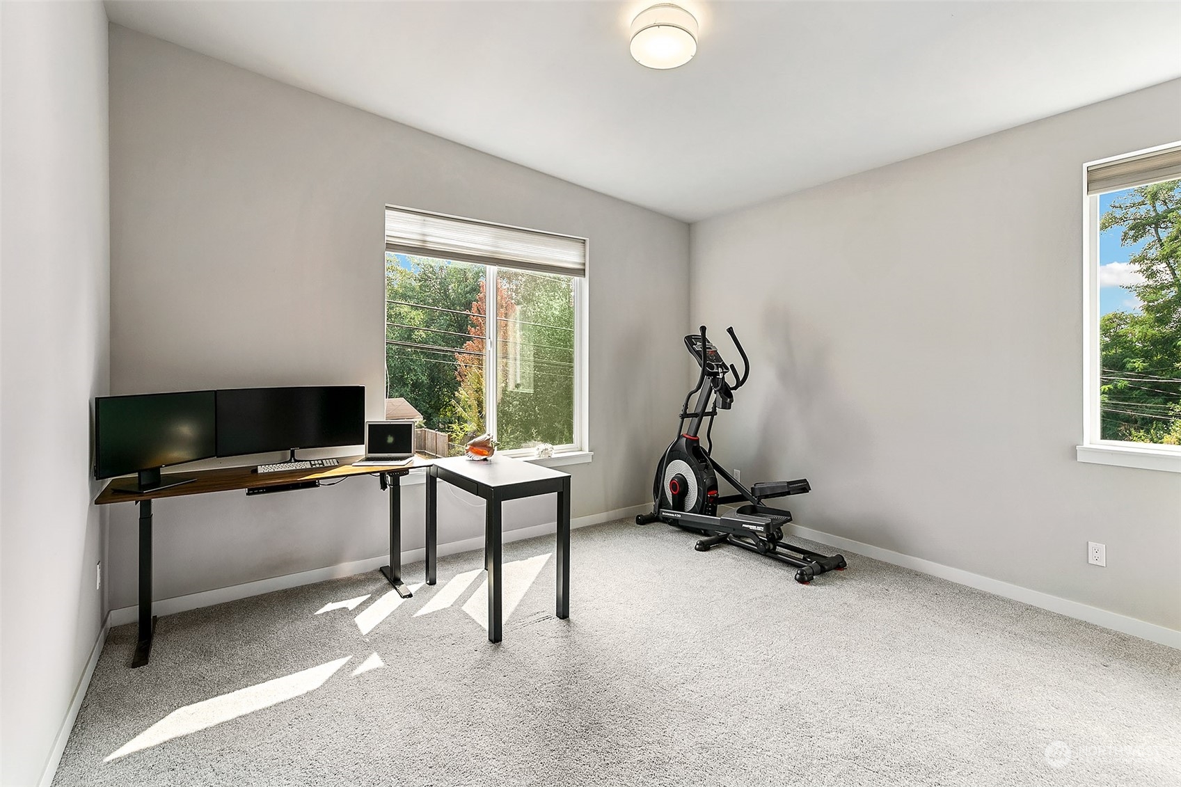 5136 South Creston Street Seattle, WA 98178 - Photo 20 of 27 a view of a workspace with furniture and a window