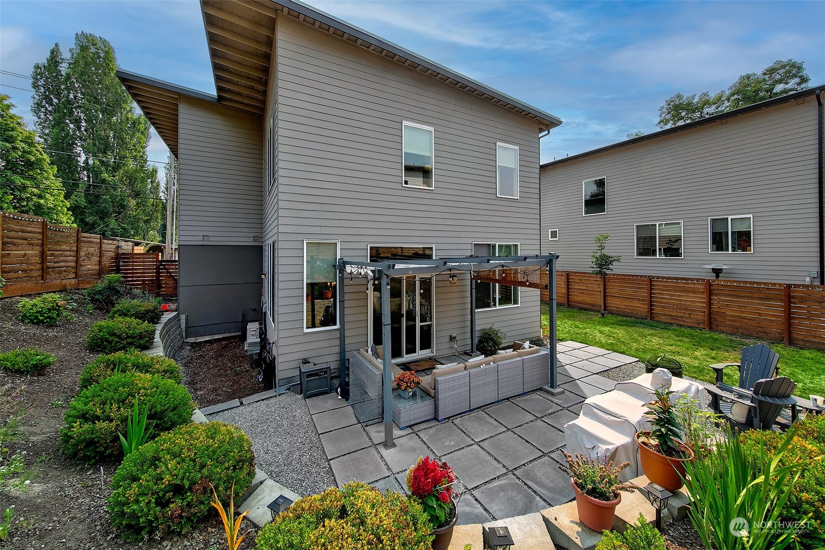 5136 South Creston Street Seattle, WA 98178 - Photo 9 of 27 a view of backyard with outdoor seating and plants