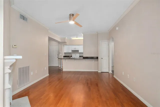 a view of kitchen with wooden floor