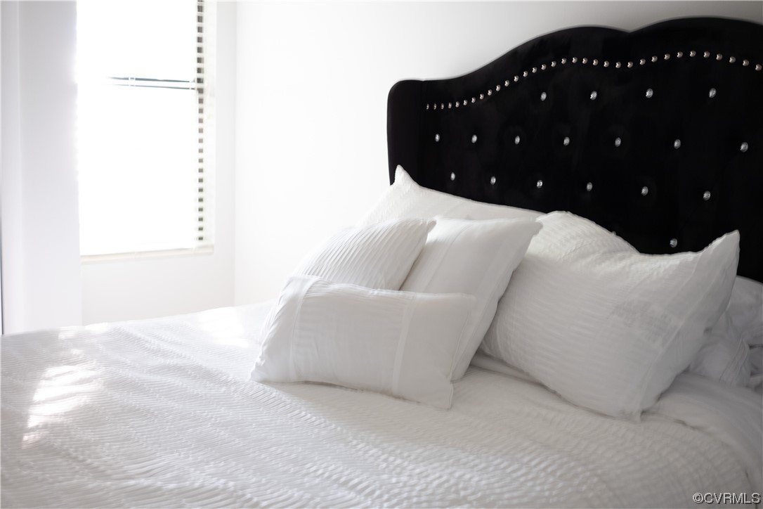 11601 East Briar Patch Drive Midlothian, VA 23113 - Photo 40 of 50 a living room with a couch