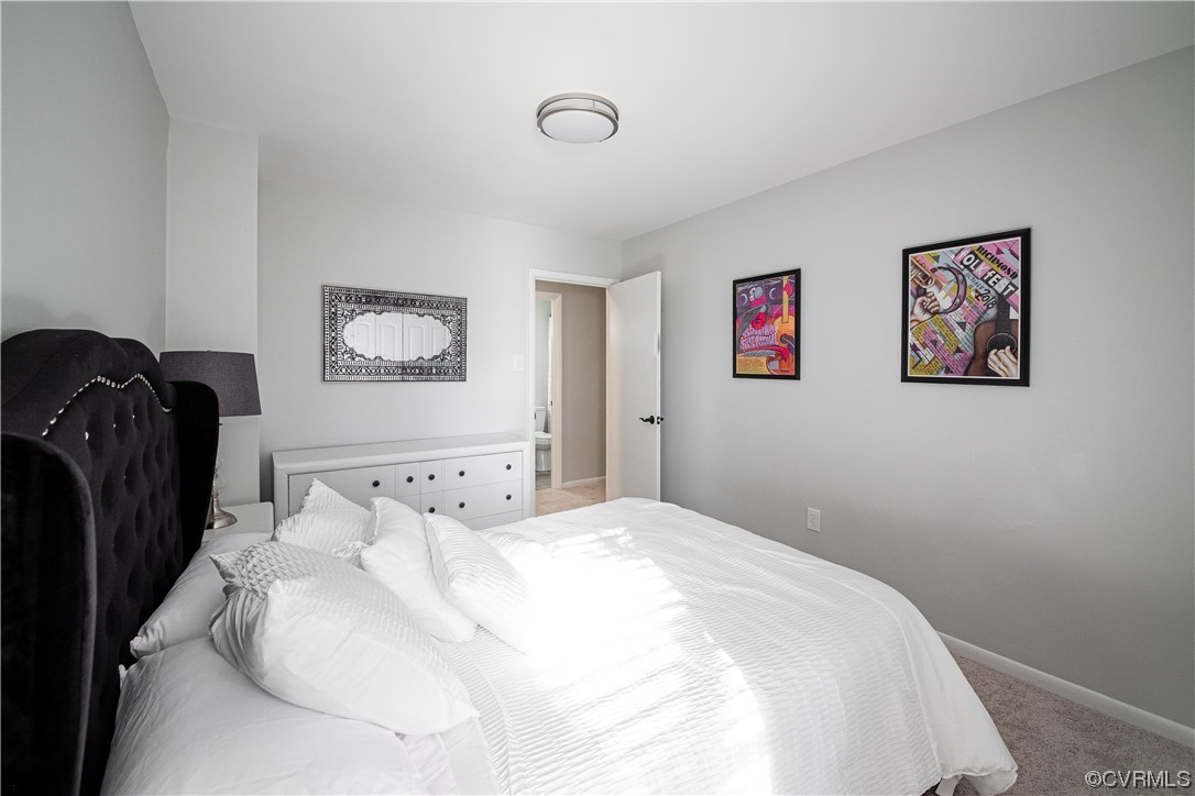 11601 East Briar Patch Drive Midlothian, VA 23113 - Photo 41 of 50 a bedroom with a bed and a painting on the wall