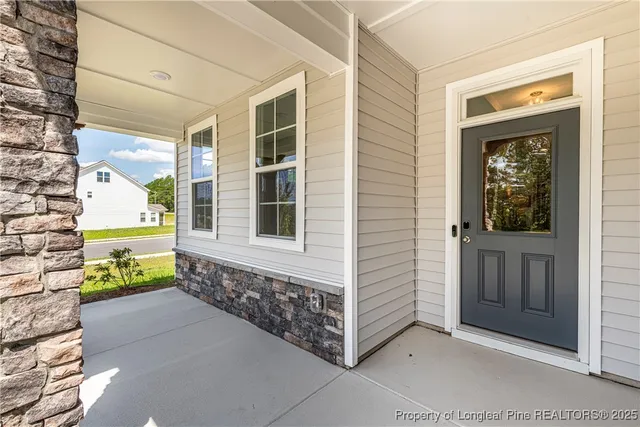 a yellow house with outdoor space