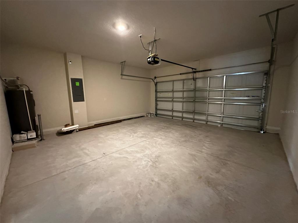 4806 Sparkling Shell Avenue Kissimmee, FL 34746 - Photo 18 of 19 a view of a garage room