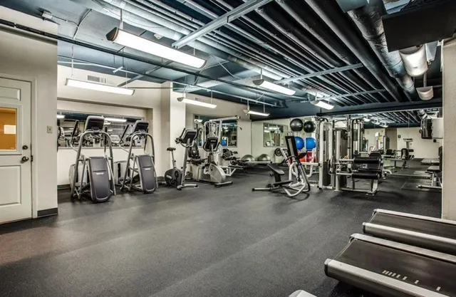 a view of a room with gym equipment