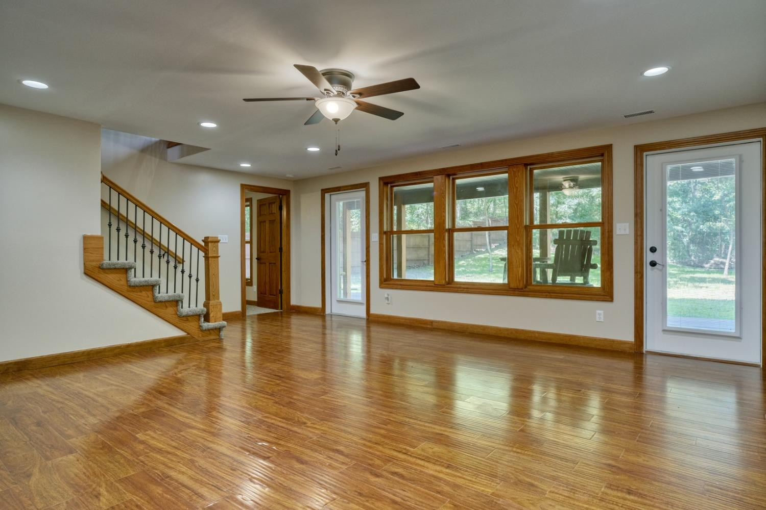 8468 Old Oak Drive Demotte, IN 46310 - Photo 22 of 35 wooden floor in an empty room with a window