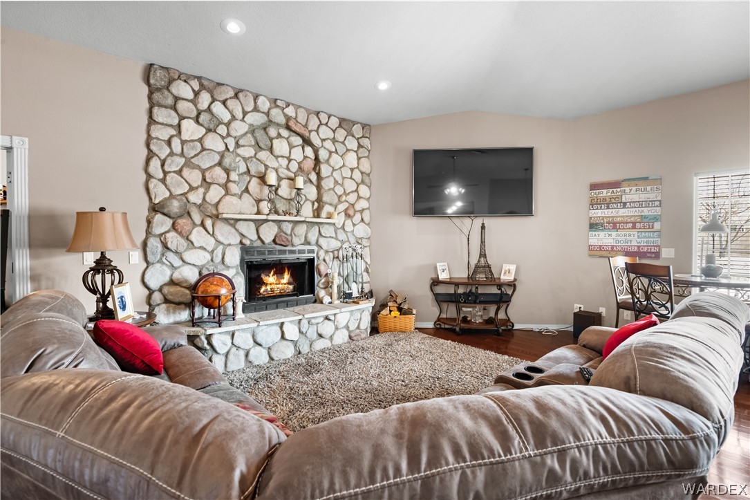 2898 Mountain Trail Road Kingman, AZ 86401 - Photo 7 of 75 a living room with furniture and a fireplace
