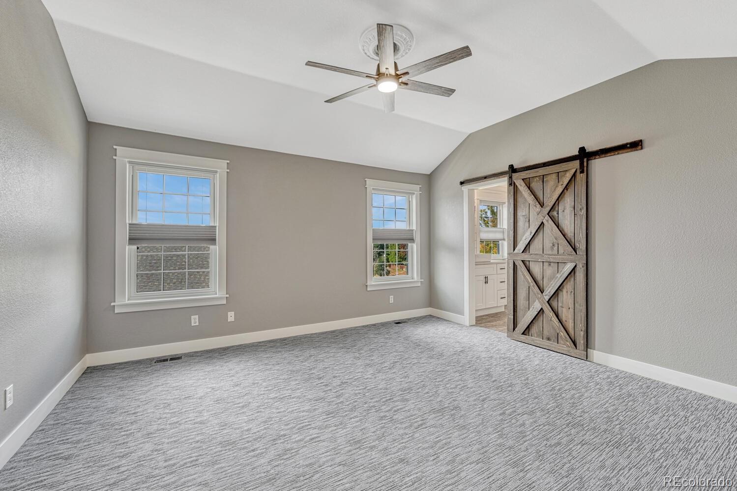 6335 Trailhead Road Highlands Ranch, CO 80130 - Photo 27 of 50 a view of an empty room with a window