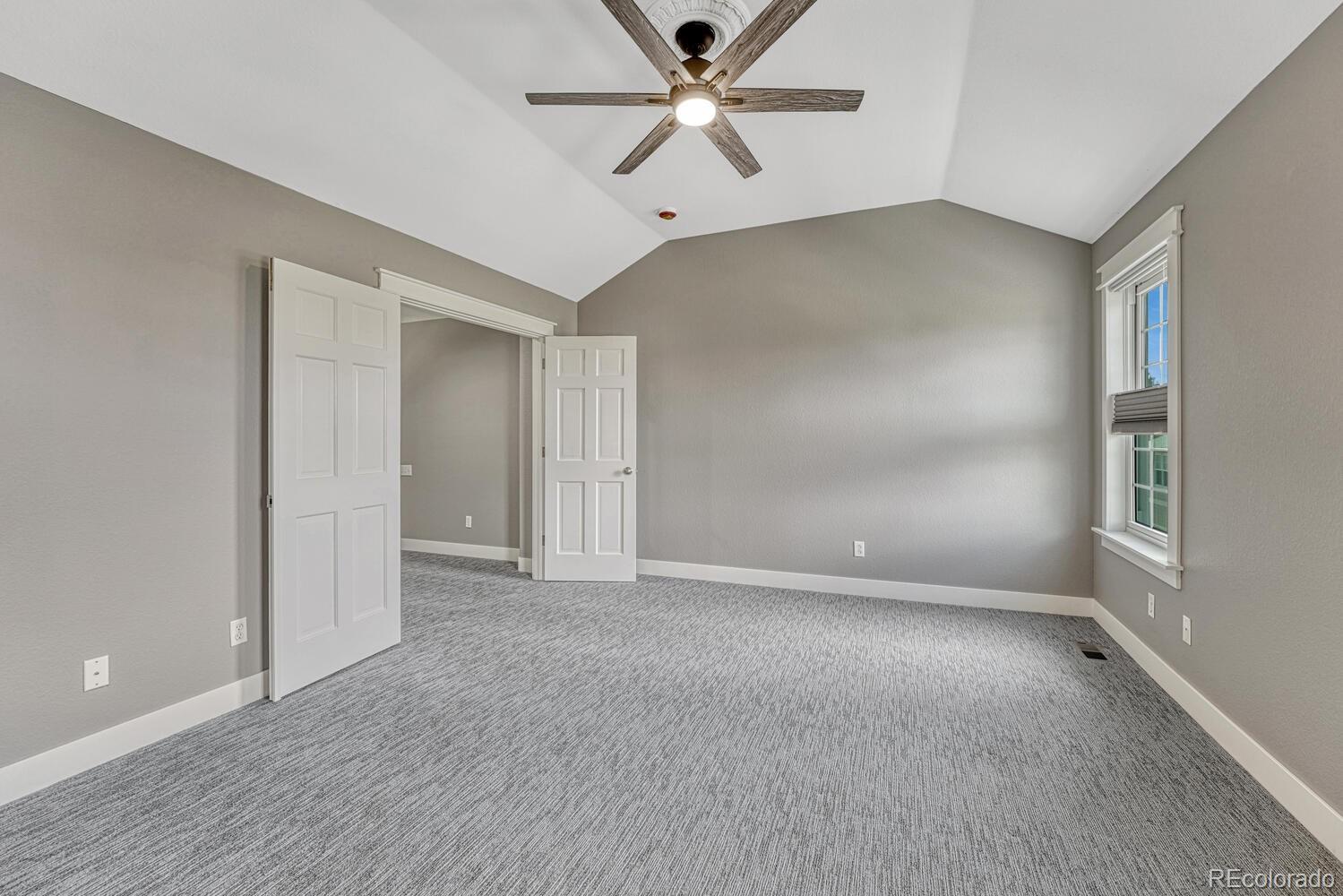 6335 Trailhead Road Highlands Ranch, CO 80130 - Photo 29 of 50 a view of an empty room with a window