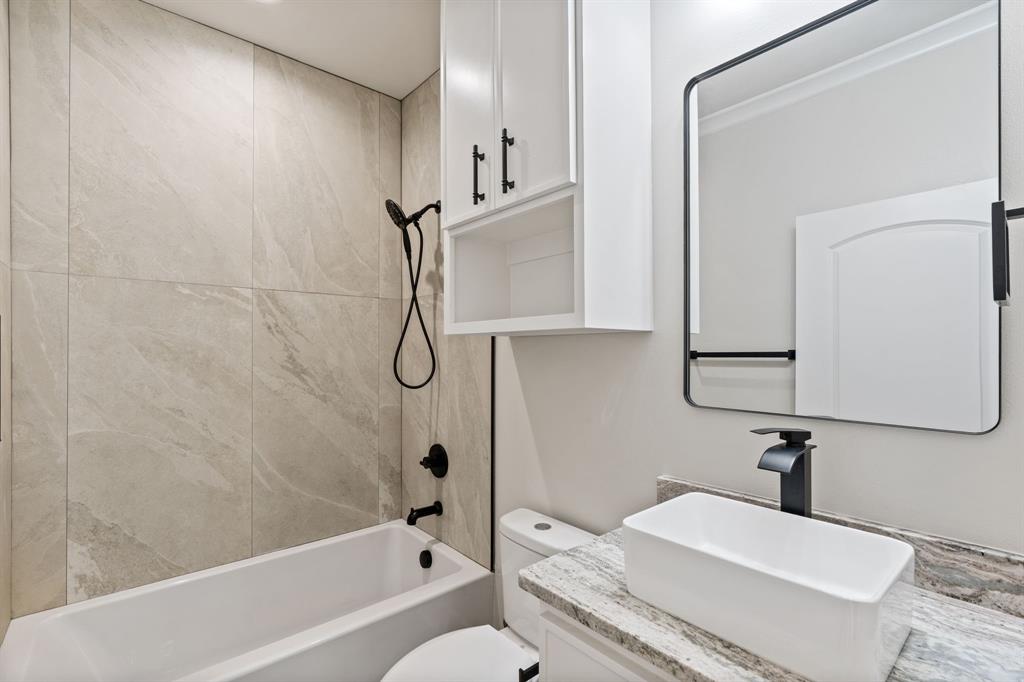 335 Perdanales Bullard, TX 75757 - Photo 10 of 37 a bathroom with a sink toilet and shower