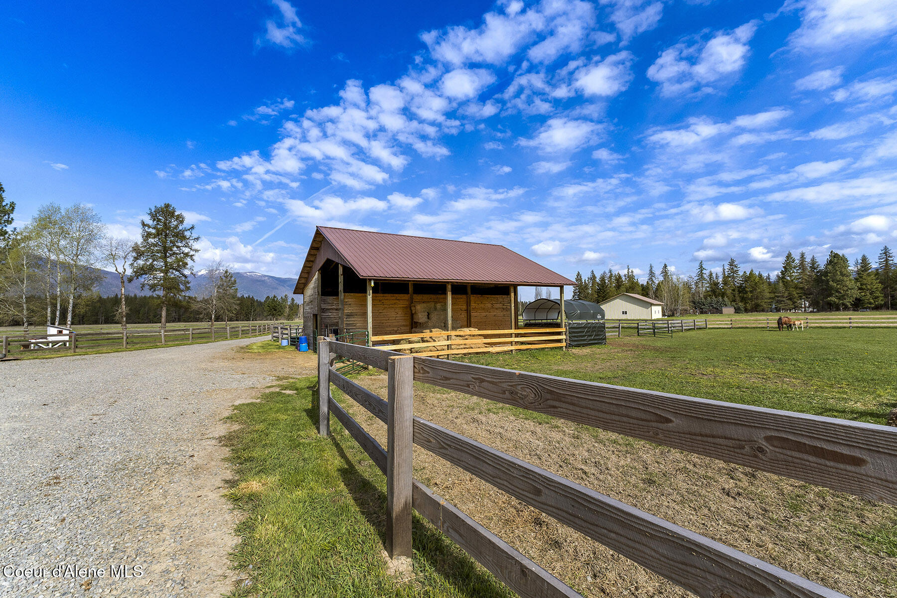 135 Honeysuckle Road Bonners Ferry, ID 83805 - Photo 20 of 28 Hay Barn & Covered Storage
