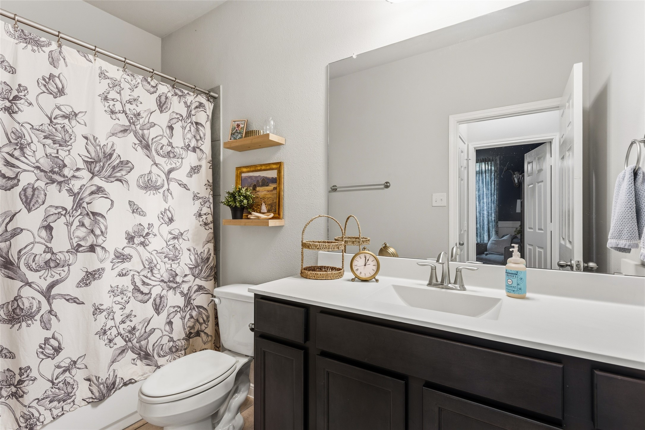 7254 Victorville Drive Rosharon, TX 77583 - Photo 17 of 27 a bathroom with a sink toilet and shower