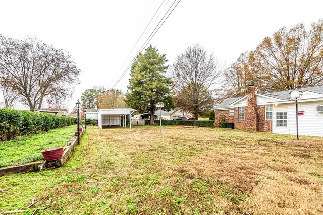 a house with trees in front of it