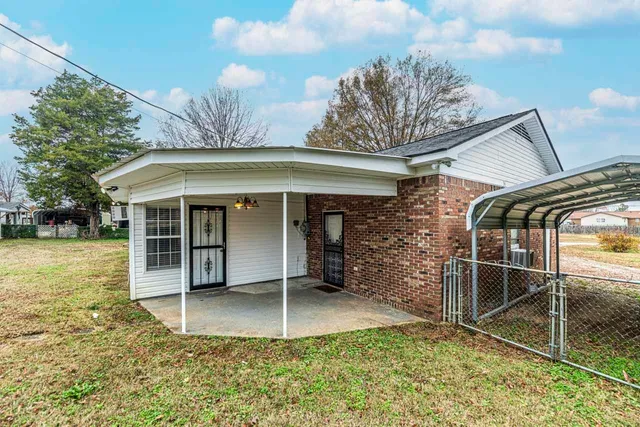 a view of a house with a porch