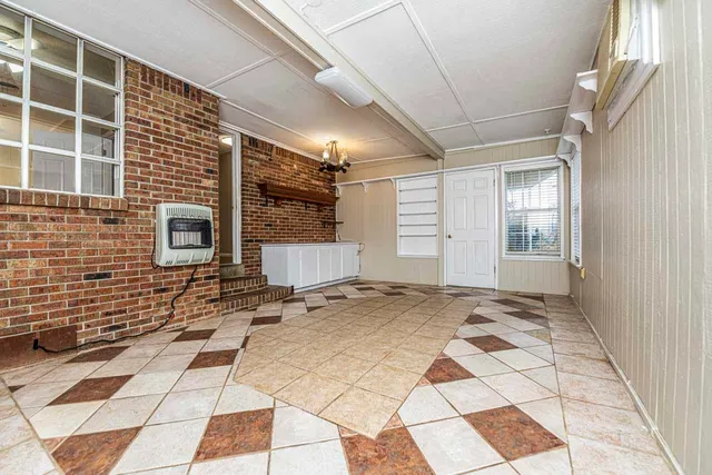 a view of a entryway door front of a house