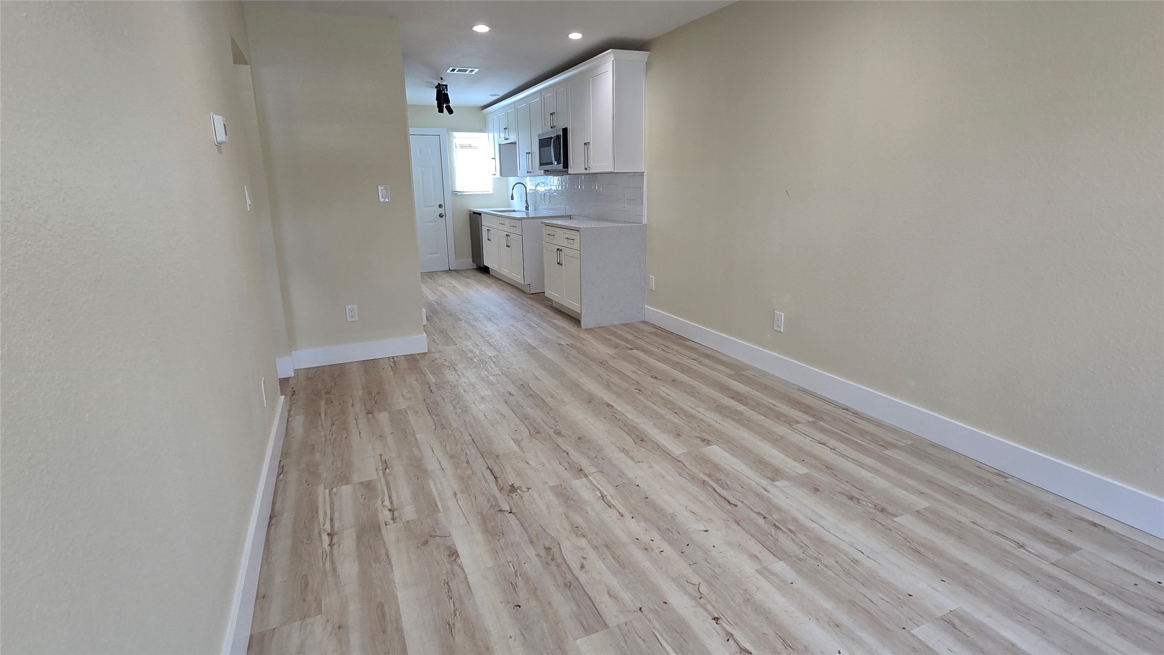 3741 Seabrook Street Houston, TX 77021 - Photo 41 of 50 a view of kitchen and wooden floor