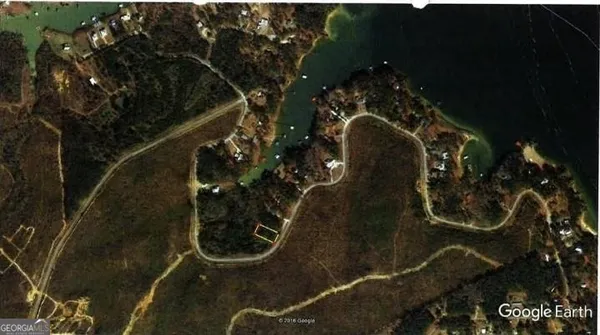 a view of a living room with a bed