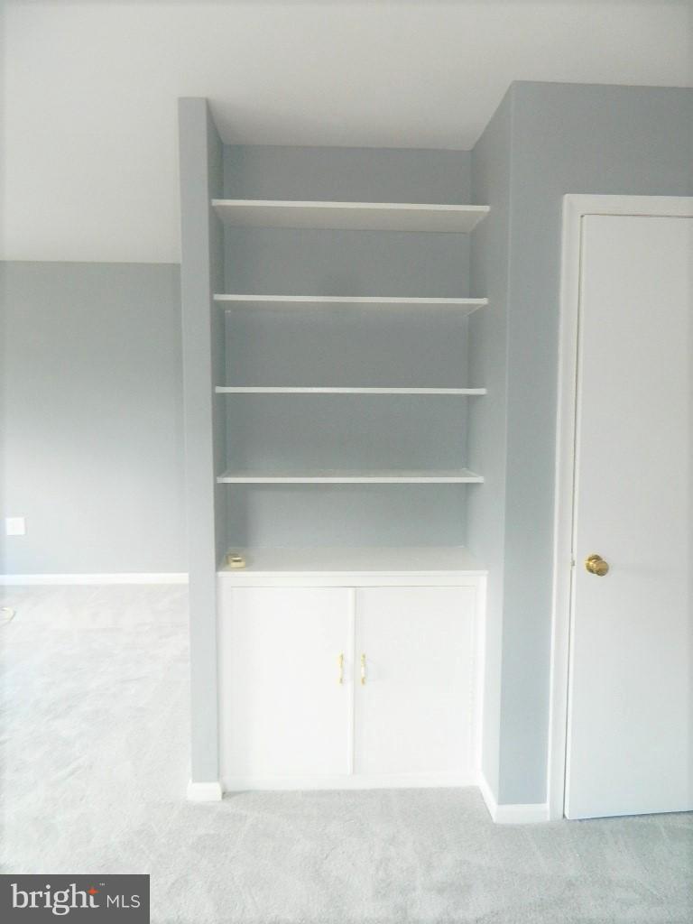 8471 Stonewall Road Manassas, VA 20110 - Photo 3 of 24 Living Room Bookcase