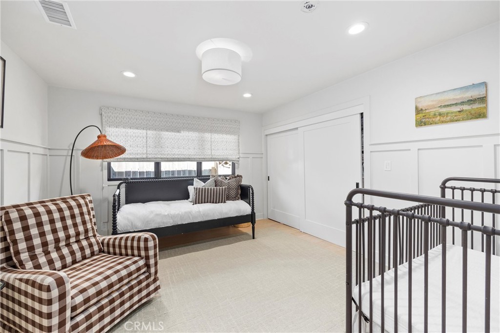 338 Bucknell Road Costa Mesa, CA 92626 - Photo 15 of 25 a bedroom with furniture and a window