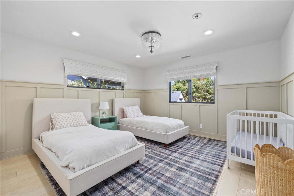 338 Bucknell Road Costa Mesa, CA 92626 - Photo 16 of 25 a bedroom with two beds and a window