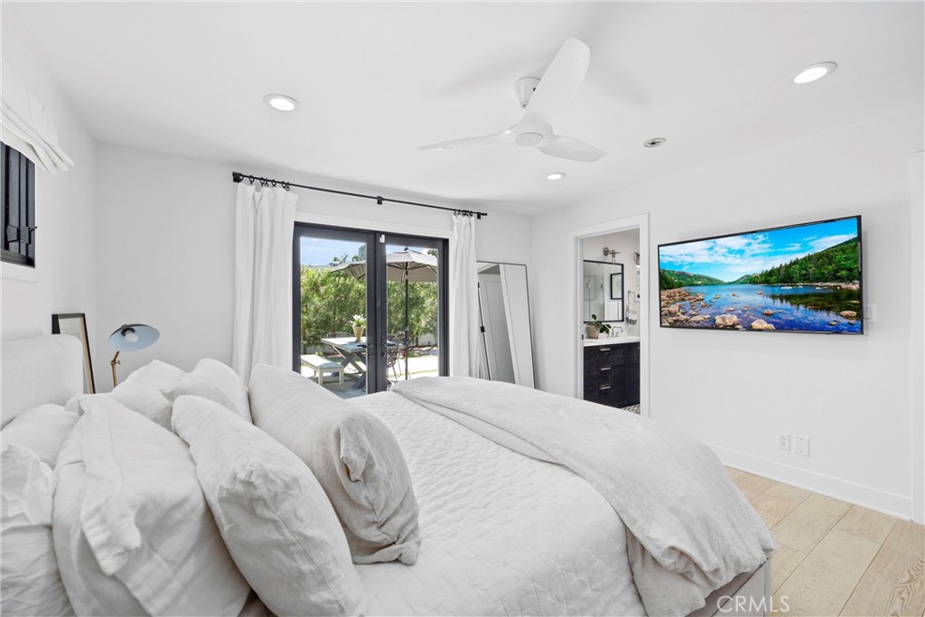 338 Bucknell Road Costa Mesa, CA 92626 - Photo 17 of 25 a bedroom with a bed and a flat screen tv