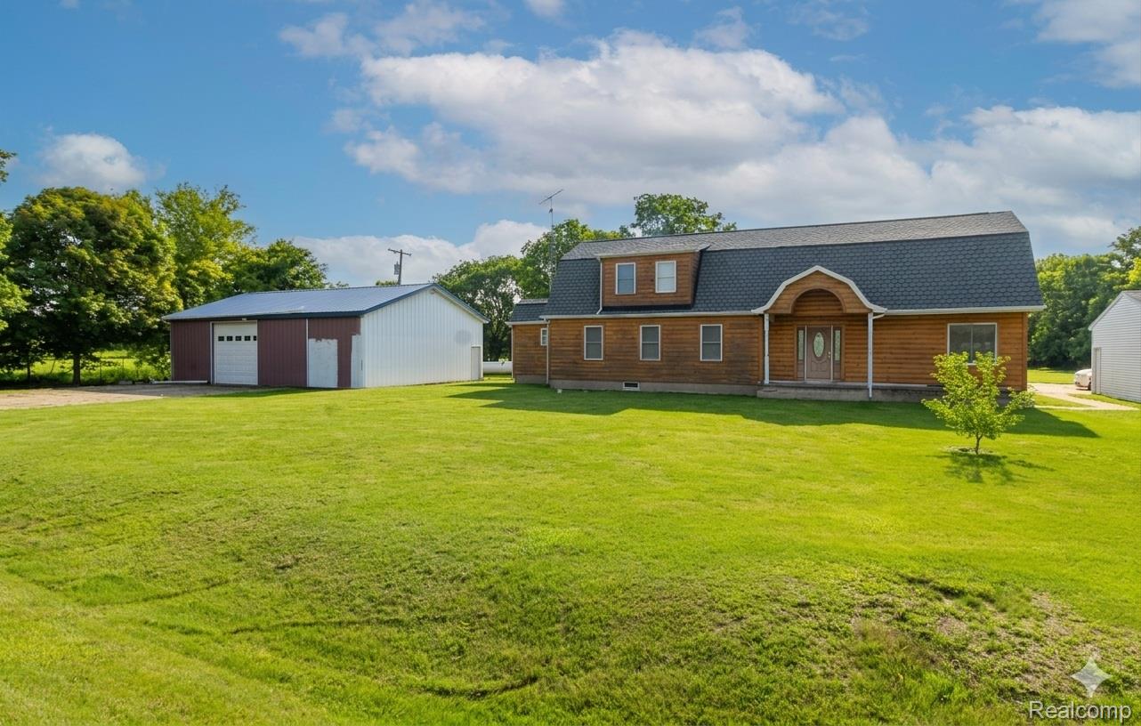 2568 Valentine Road Lapeer, MI 48446 - Photo 42 of 42 Brick Colonial home situated on expansive manicured grounds with mature landscaping