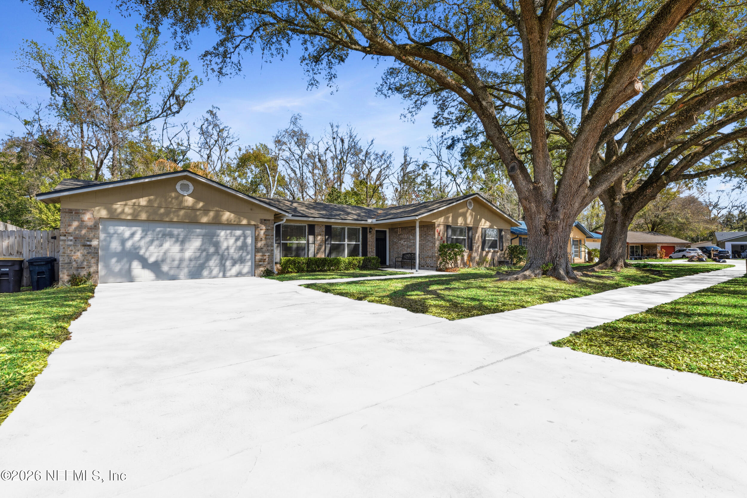 8729 Pinon Drive Jacksonville, FL 32221 - Photo 2 of 33 a view of a house with a yard