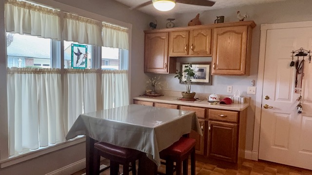 3361 Turner Drive Springfield, OH 45504 - Photo 9 of 18 This cozy eat-in kitchen features rich wood cabinetry and ample natural light.