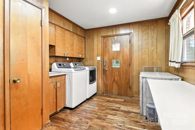 a view of a storage & utility room with a window