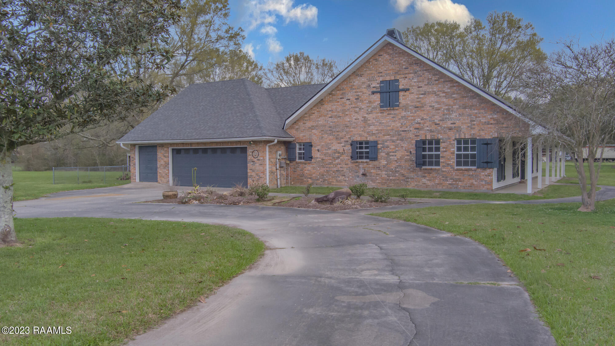 420 Austin Road Youngsville, LA 70592 - Photo 8 of 41 Side Of House garage_