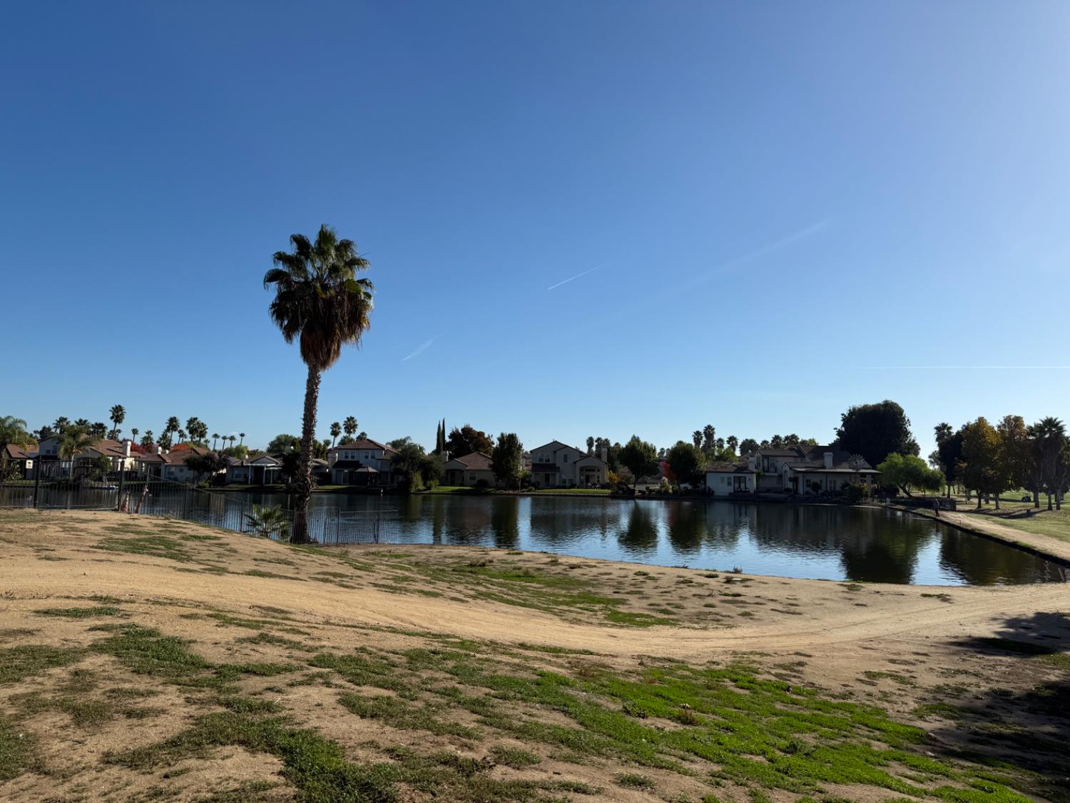 3165 Augusta Street Chowchilla, CA 93610 - Photo 3 of 8 a view of a lake with boats