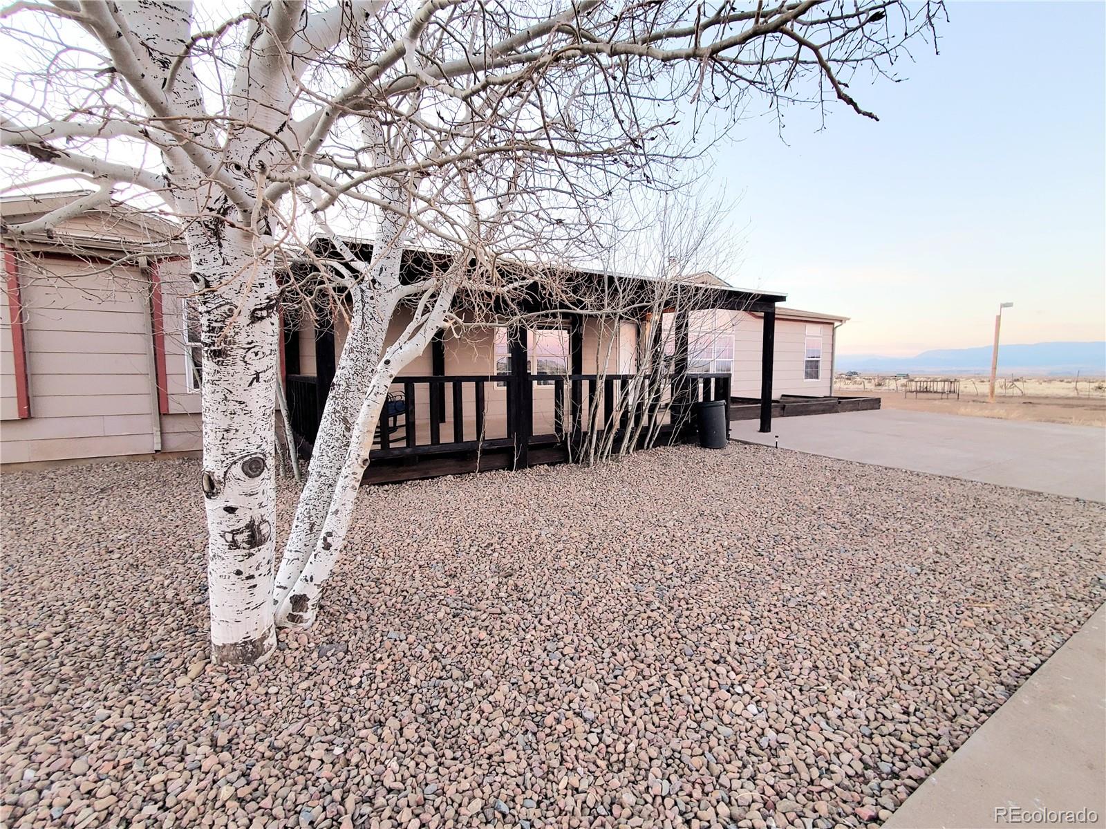 5339 County Road 19 Florence, CO 81226 - Photo 8 of 50 a view of a backyard of the house