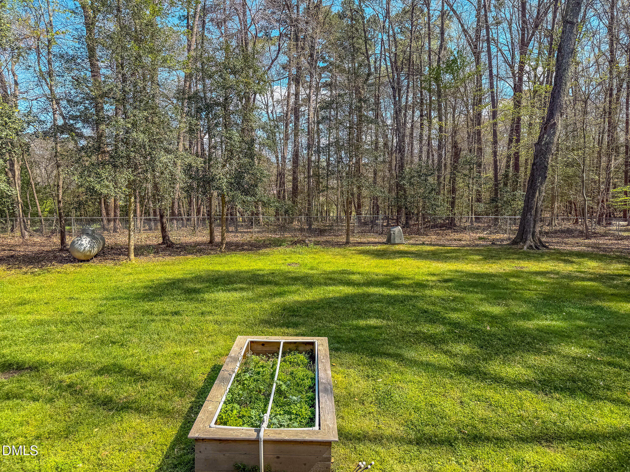 128 Cardens Cove Road Timberlake, NC 27583 - Photo 50 of 54 a view of a swimming pool with a yard