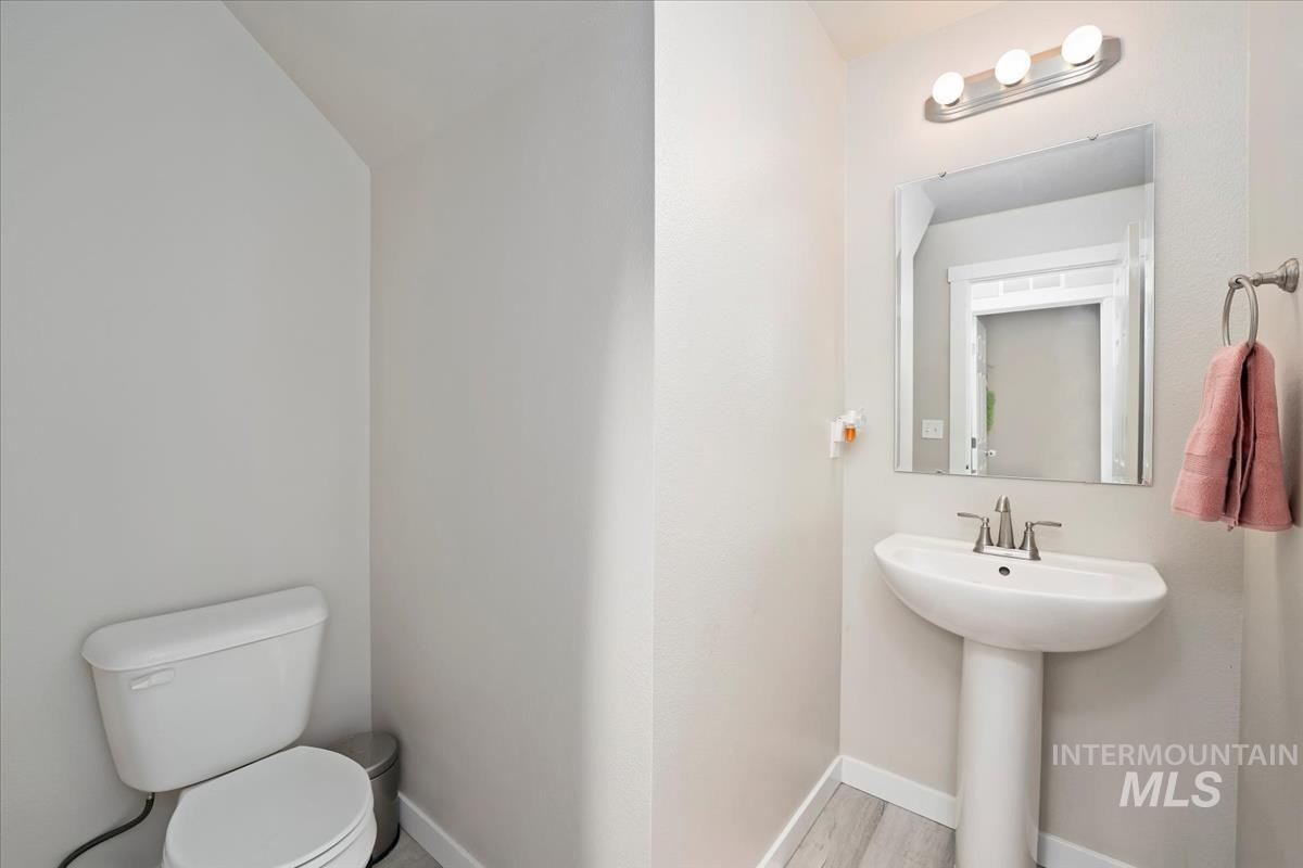 4585 West Everest Street Meridian, ID 83646 - Photo 15 of 37 Half bath featuring baseboards and toilet