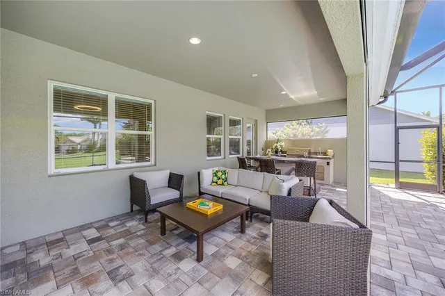a living room with furniture and a gate