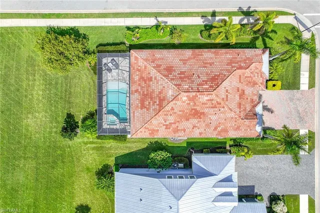 a view of swimming pool with a yard