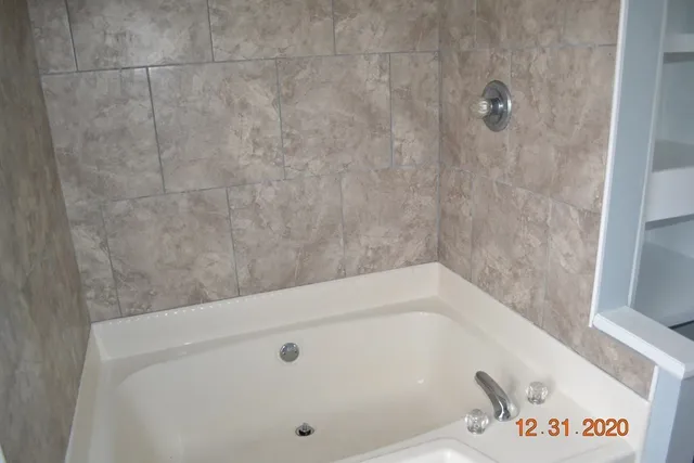 a bathroom with a bathtub