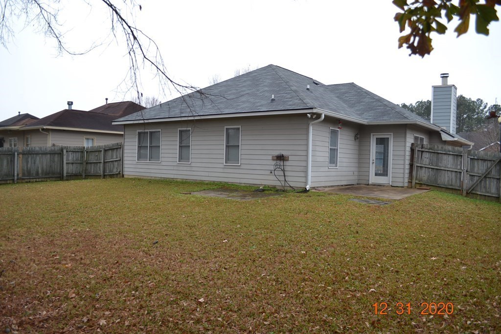 7108 Vinings Way Columbus, GA 31907 - Photo 9 of 11 a view of a house with a backyard